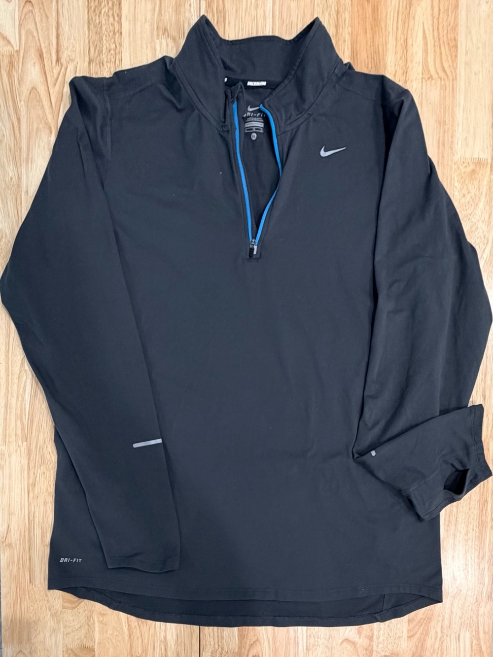 Nike Black Performance Quarter-Zip Jacket with Blue Trim